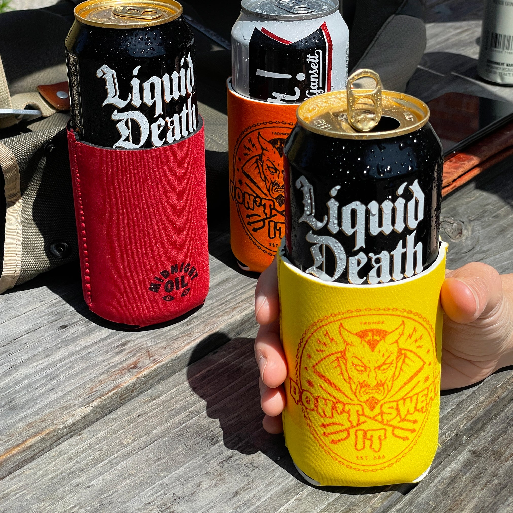 http://midnightoilgoods.com/cdn/shop/products/MidnightOil_Koozies2.jpg?v=1651526527